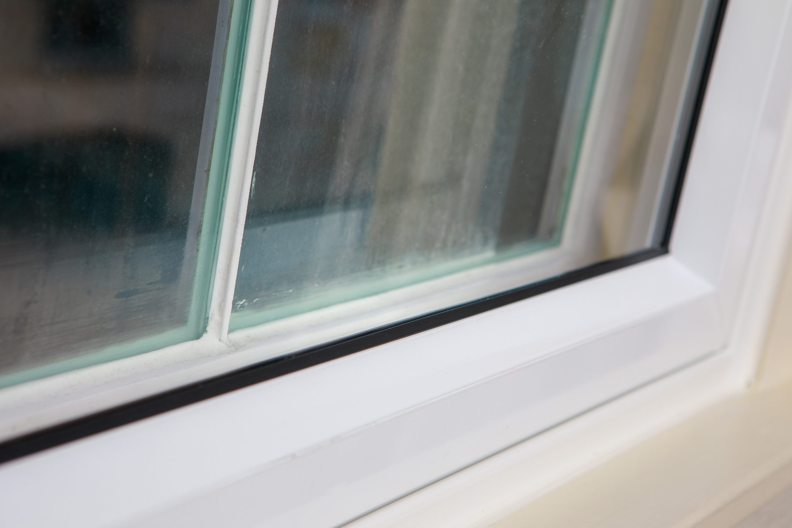 Hinged secondary glazing